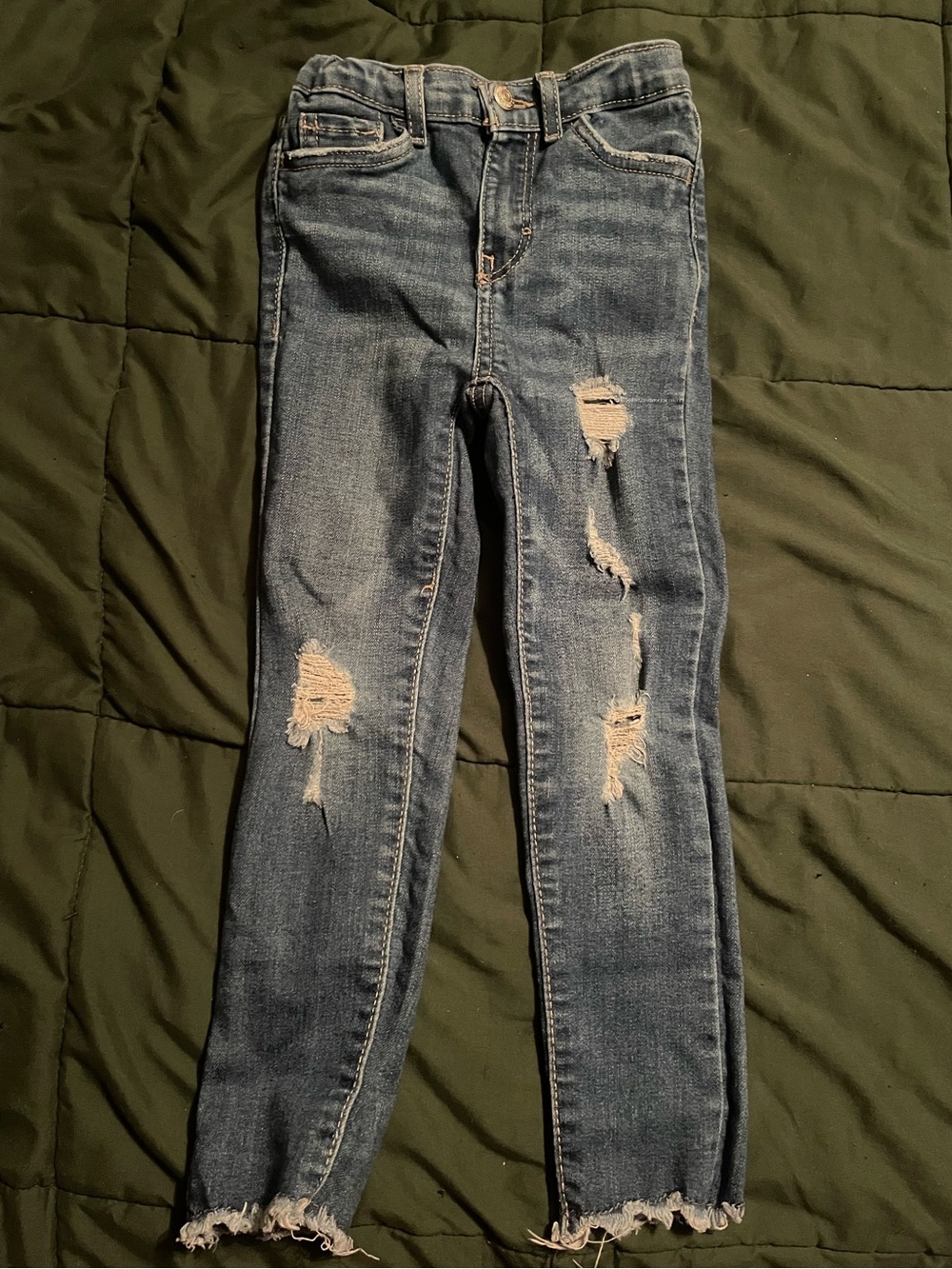 Distressed Levi’s Jeans